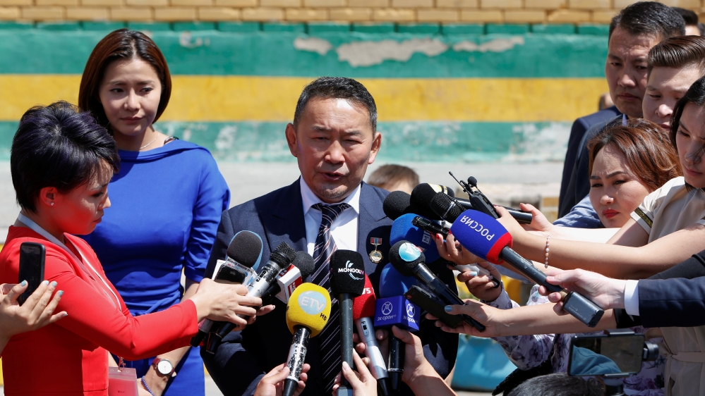 Khaltmaa Battulga, the candidate of the opposition Democratic Party, talks to reporters after voting in the second round of presidential elections in Ulaanbaatar