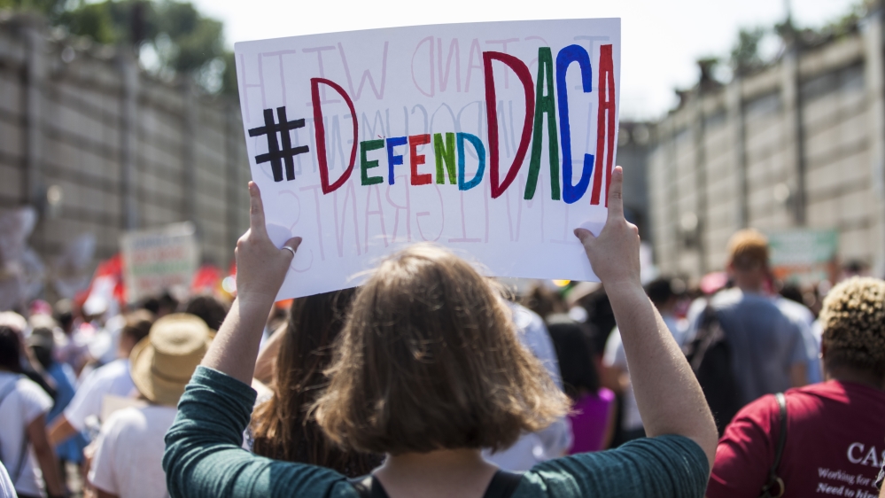 Demonstrators march during a protest in response to the Trump Administration’s announcement that it would end the DACA programme in 2017