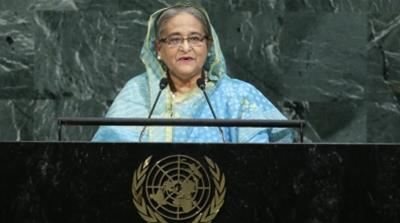 Justice Sinha accuses Hasina of pressing him to rule 'in favour of the government' [Eduardo Munoz/Reuters]