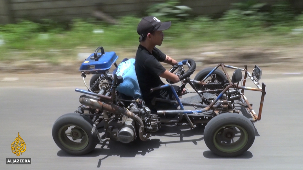 Dzoel designed a vehicle for himself to get around Banyuwangi. [Hassan Ghani/Al Jazeera]