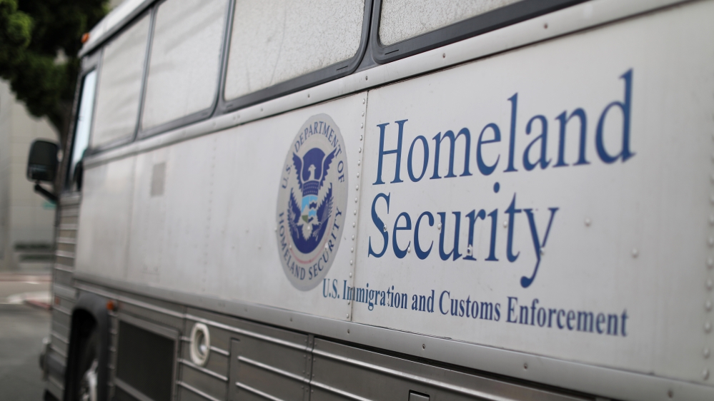 Homeland Security ICE bus is parked outside federal jail in San Diego