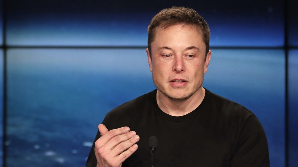 Elon Musk, founder, CEO, and lead designer of SpaceX, speaks at a news conference after the Falcon 9 SpaceX heavy rocket launched successfully [John Raoux/AP Photo] 