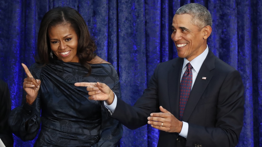 Former U.S. President Barack Obama and former first lady Michelle Obama attend their portrait unveiling ceremony in Washington