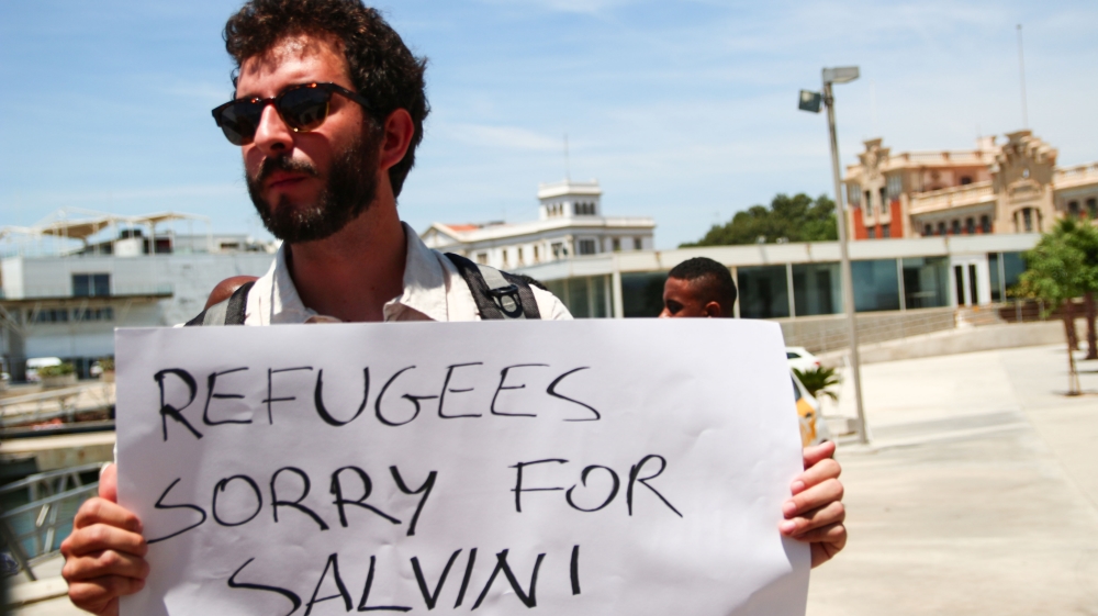 Antonio, an Italian PhD student living in Madrid, traveled to Valencia in Spain to protest his government's decision to bar the MV Aquarius from entering Italian ports [Al Jazeera]