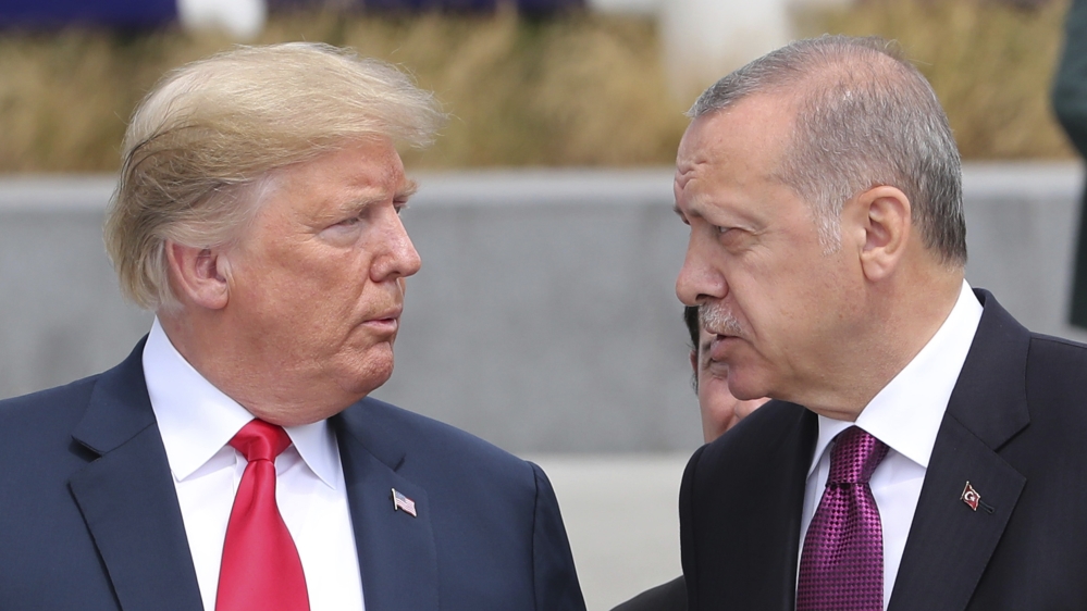 U.S. President Donald Trump, left, talks to Turkish President Recep Tayyip Erdogan, right