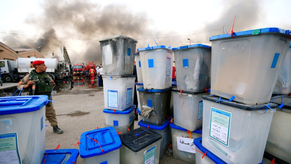 FILE PHOTO: Ballot boxes are seen after a fire at a storage site in Baghdad, housing the boxes from Iraq''s May parliamentary election
