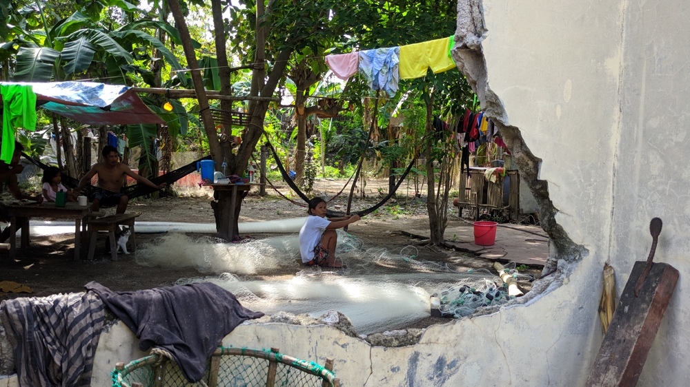 Sicogon residents have tried to rebuild their lives after Haiyan, but say they’re suffering even more now due to land grabbing by private corporations [Khalil Majeed/Al Jazeera]