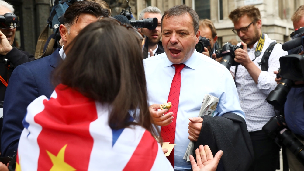 Arron Banks (centre)