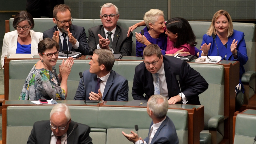 Independents (L to R) Cathy McGowan, Adam Bandt, Andrew Wilkie, Kerryn Phelps, Julia Banks and Rebekha Sharkie celebrate passing the Medivac Bill in the House of Representatives on February 12, 2019