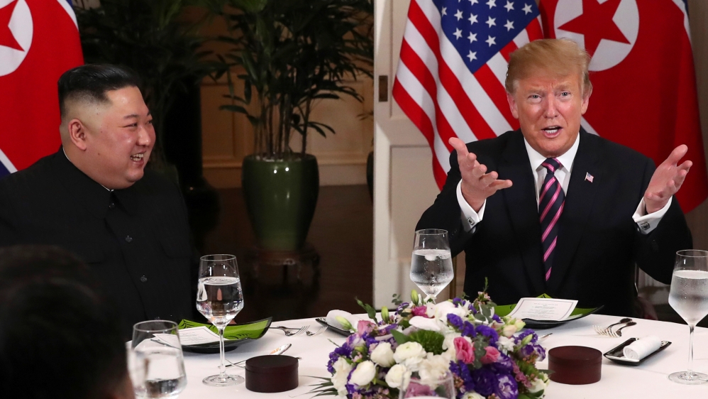 Trump and Kim sit down for dinner at the Metropole Hotel in Hanoi [Leah Millis/ Reuters]