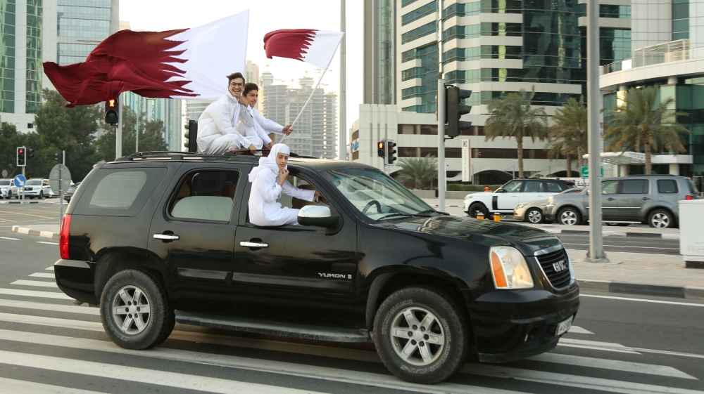 Young Qatari fans welcome their champion footballers home [Showkat Shafi/Al Jazeera]
