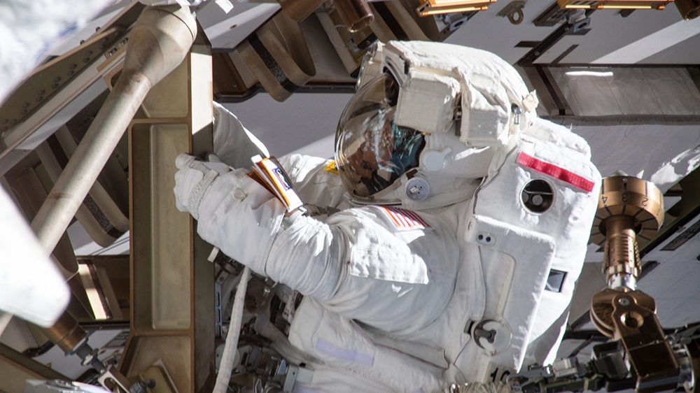 This image made available by NASA shows astronaut Anne McClain working on March 22, 2019, on the International Space Station's Port-4 truss structure [HO/NASA/AFP]