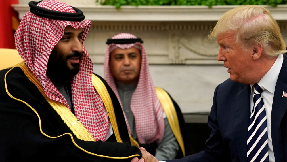 FILE PHOTO: U.S. President Donald Trump shakes hands with Saudi Arabia''s Crown Prince Mohammed bin Salman in the Oval Office at the White House in Washington