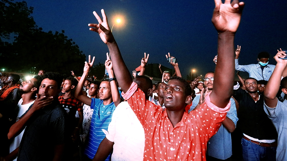 Crowds of demonstrators have spent five nights outside the military headquarters, singing and dancing to revolutionary songs [Reuters]