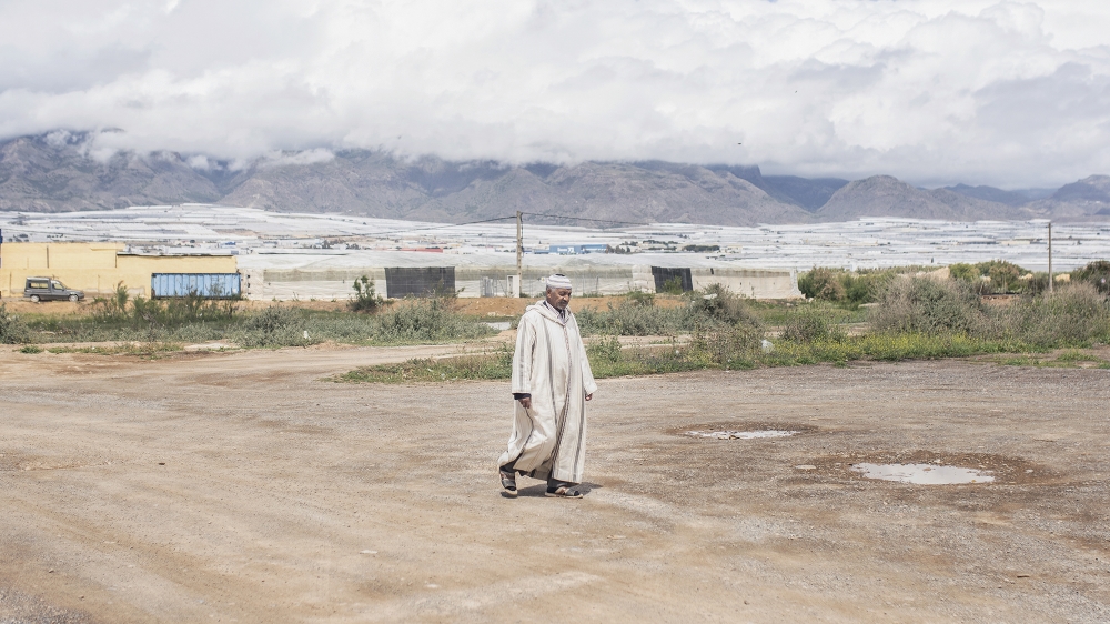 El Ejido's streets are dotted with Moroccan migrants [Guillem Trius/Al Jazeera]