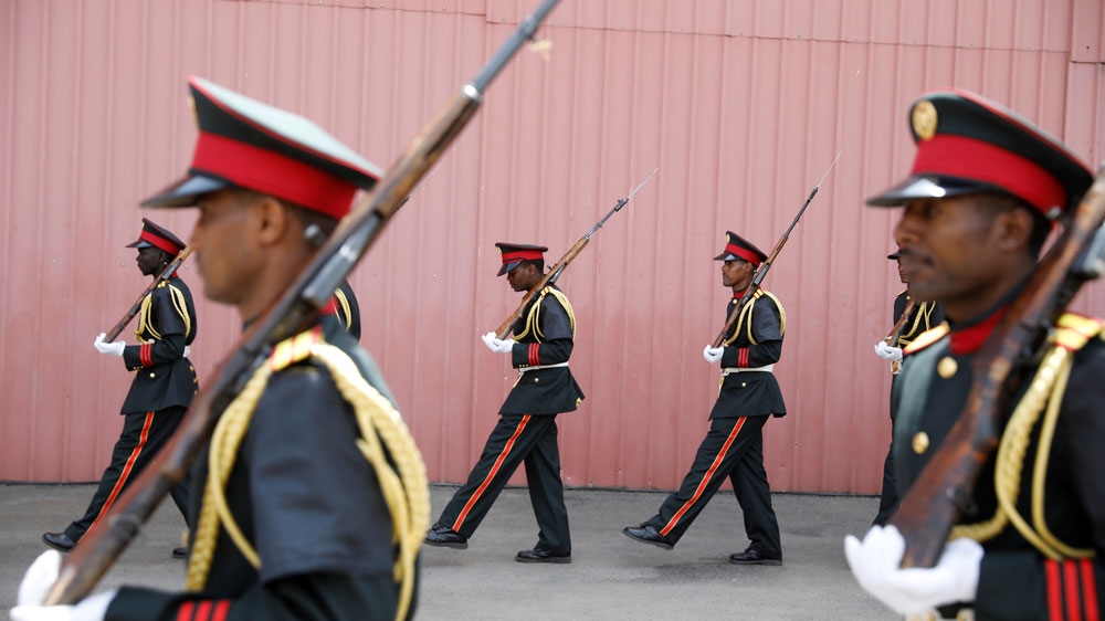 Honour guards march after the memorial ceremony for the Ethiopian Army Chief