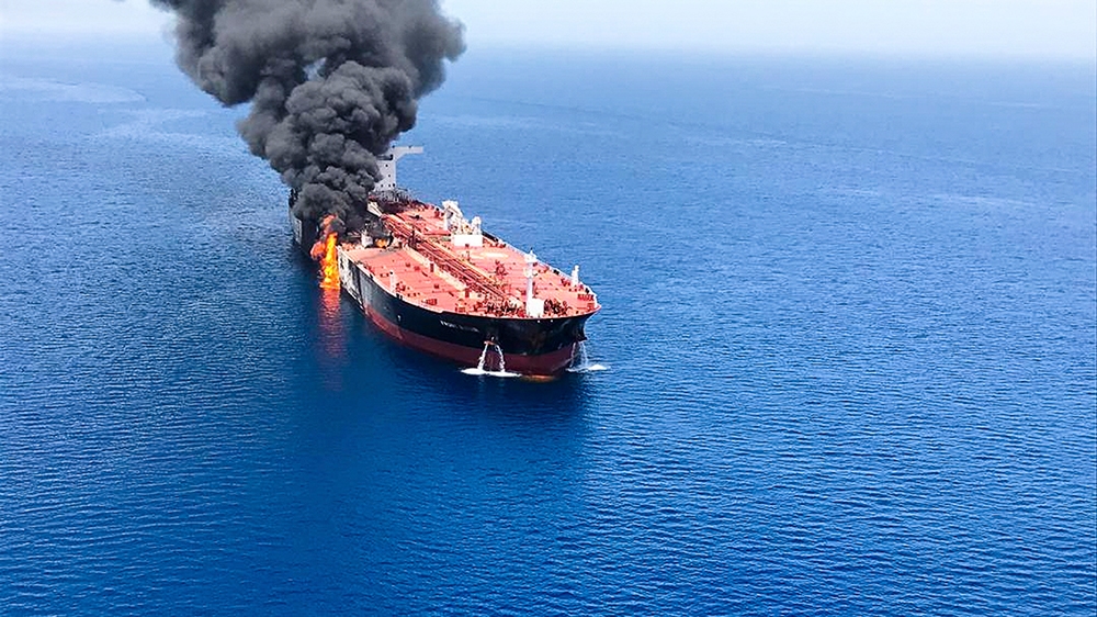 An oil tanker is on fire in the sea of Oman, Thursday, June 13, 2019. Two oil tankers near the strategic Strait of Hormuz were reportedly attacked on Thursday, an assault that left one ablaze and adrift as sailors were evacuated from both vessels and the U.S. Navy rushed to assist amid heightened tensions between Washington and Tehran.