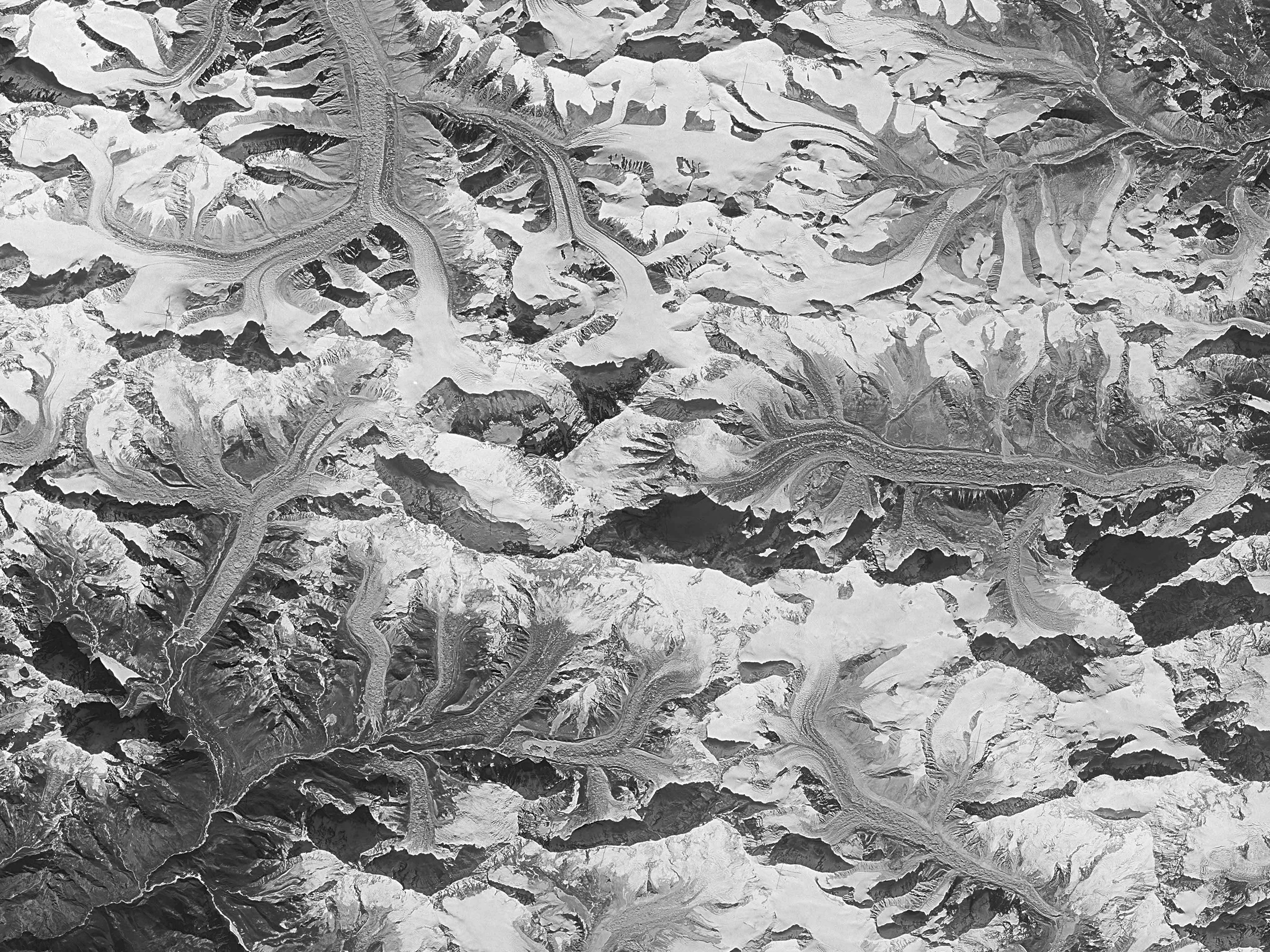 This Jan. 3 1976 photo made by the National Reconnaissance Office shows Mount Everest at center. This and other once-classified Cold War era spy satellite images are showing scientists that glaciers o