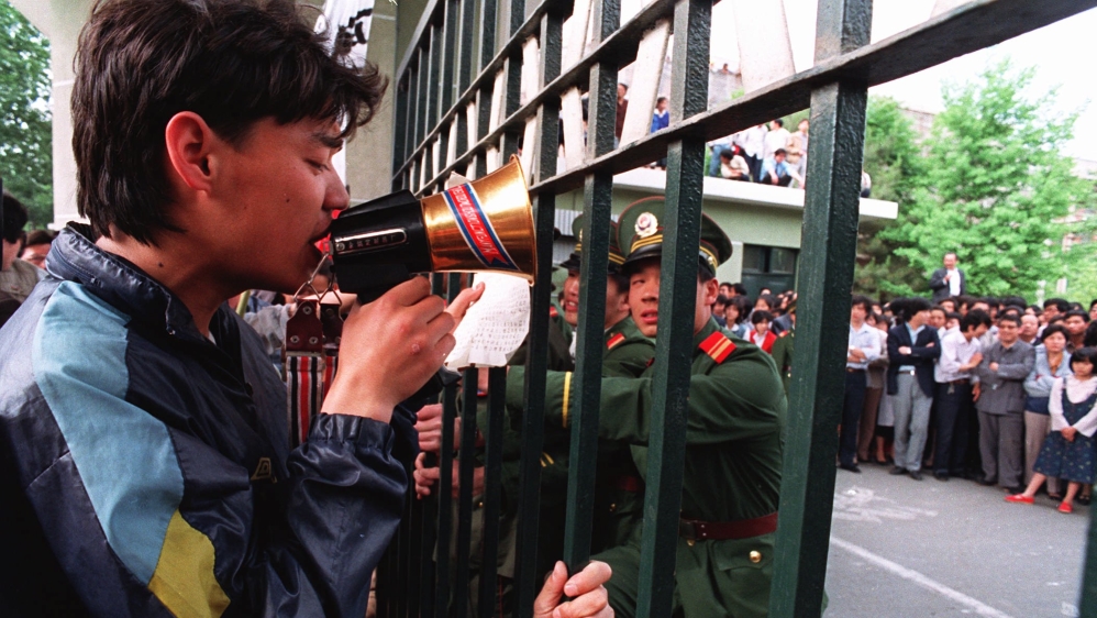 Wu’er Kaixi leading a student protest at the offices of the People’s Daily in Beijing on May 9, 1989