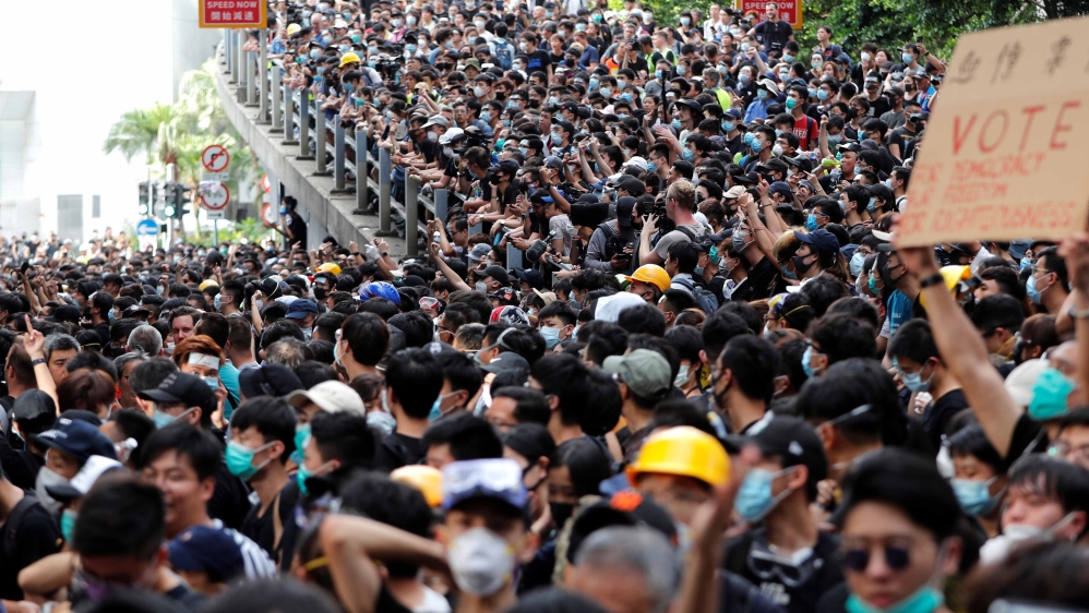 Protesters demonstrate outside police headquarters, demanding Hong Kong’s leaders to step down and withdraw the extradition bill, in Hong Kong, China June 21, 2019.