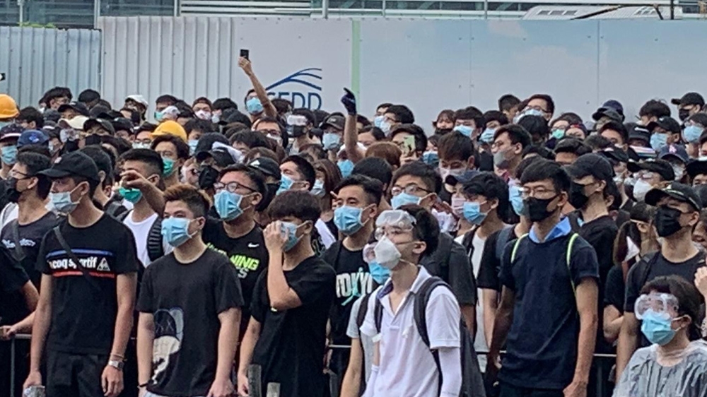 Protesters, many wearing black shirts, started gathering around Hong Kong’s Legco complex from early in the morning