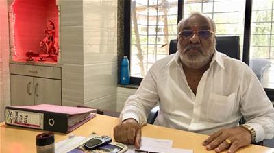 Rising costs of imported oil are hurting Indian business owners like truck operator Vilas Kadam