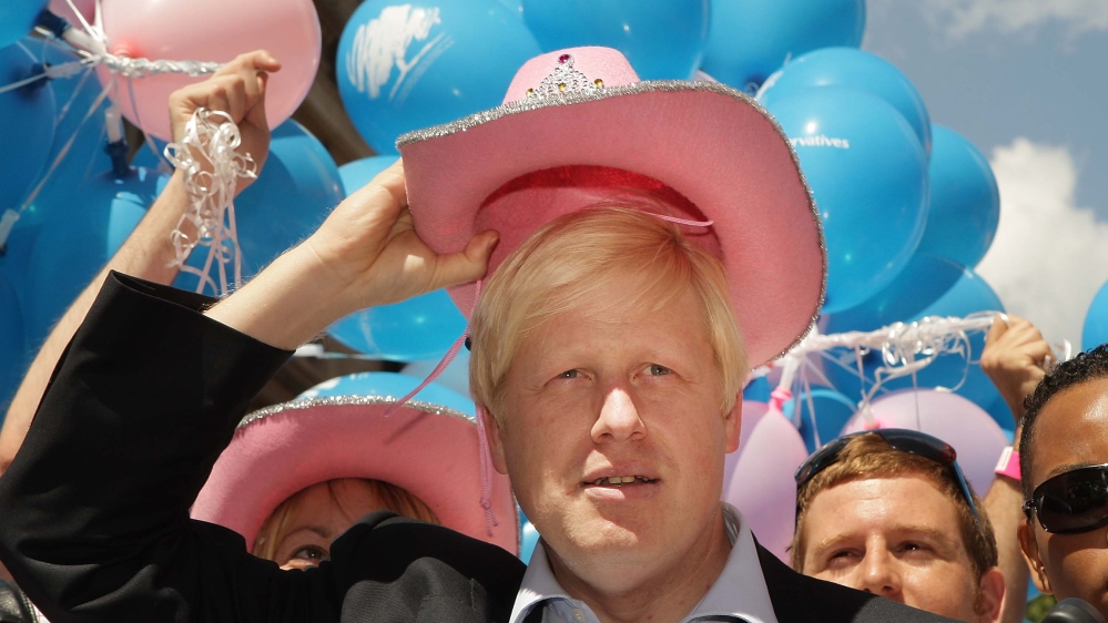 London Mayor Boris Johnson wears a pink stetson hat at the Gay Pride parade on July 5, 2008 in London, England. The parade consists of celebrities, floats, and performers celebrating the UK's largest
