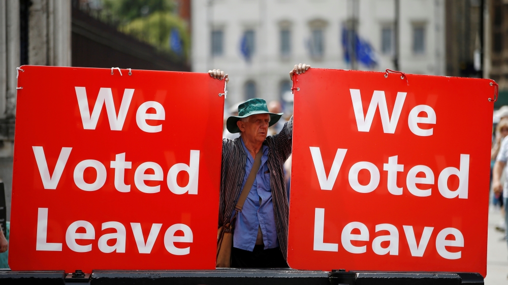 A pro-Brexit demonstrator is seen outside the Houses of Parliament in London on July 17, 2019