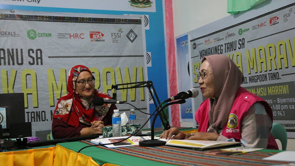 Sorhaila L Latip-Yusoph, left, a professor and radio host, said that with the government rehabilitation effort, the local Meranao community are mostly cut off from the planning