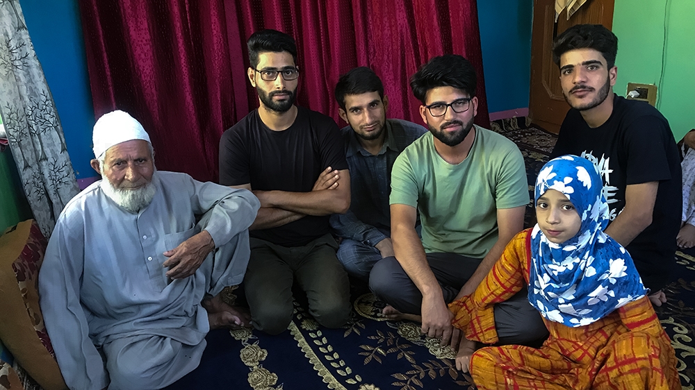 Rasheed, in a green T-shirt, from Awantipora said the paramilitary personnel wanted him to spy for them