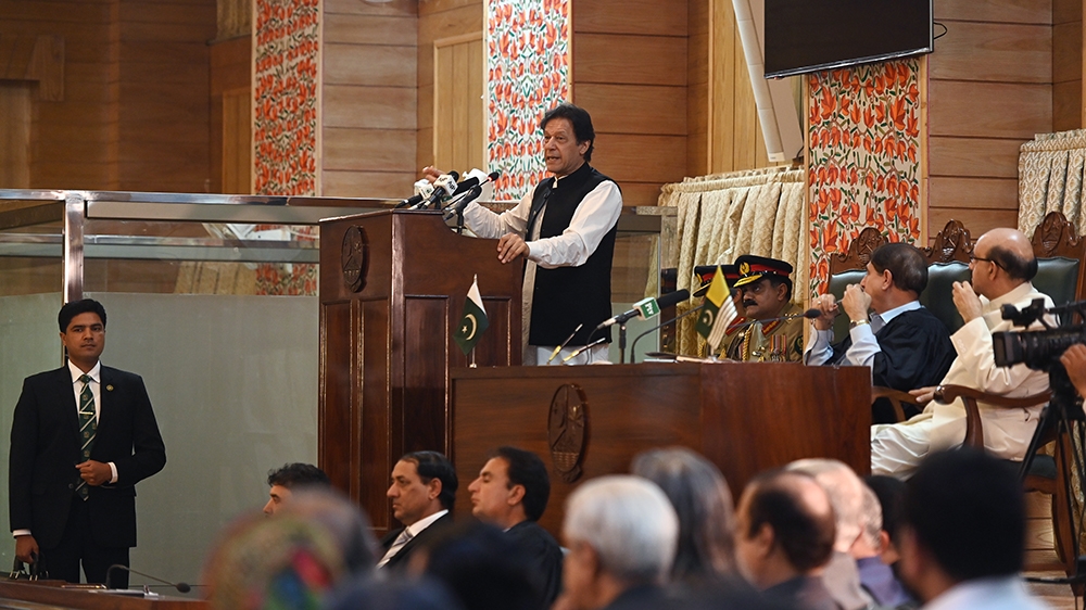 Pakistan''s Prime Minister Imran Khan (C) addresses the legislative assembly in Muzaffarabad, the capital of Pakistan-controlled Kashmir on August 14, 2019, to mark the country''s Independence Day. - Hi
