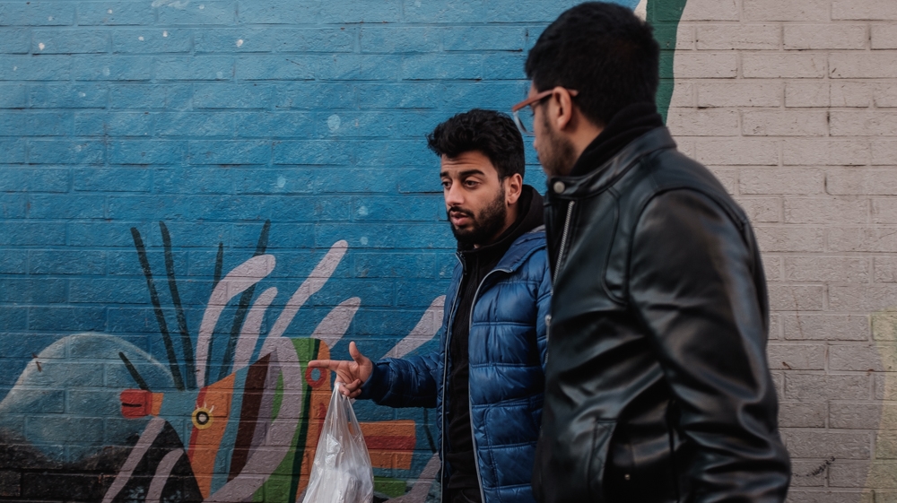 Twenty-one-year-old Ismail Mahaj walks through Molenbeek with a friend. He describes the neighbourhood as being ‘like a family’