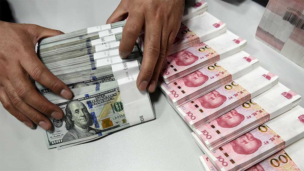 Chinese yuan and U.S. dollar banknotes