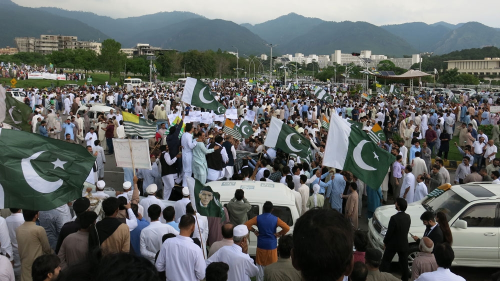 Thousands protest outside Pakistan’s parliament in Islamabad to express solidarity with Kashmir
