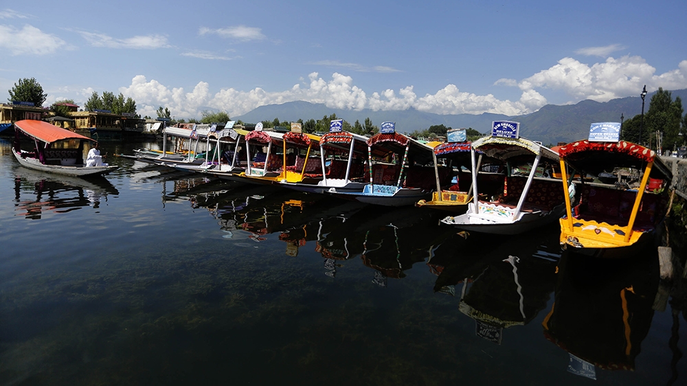 Empty boats in Srinagar’s Dal Lake after tourists were ordered to leave Kashmir