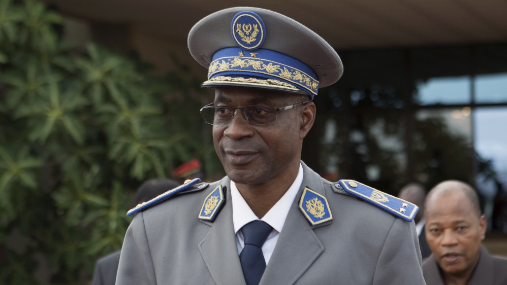 General Diendere arrives at the airport to greet Senegal''s President Sall and Benin''s President Boni in Ouagadougou