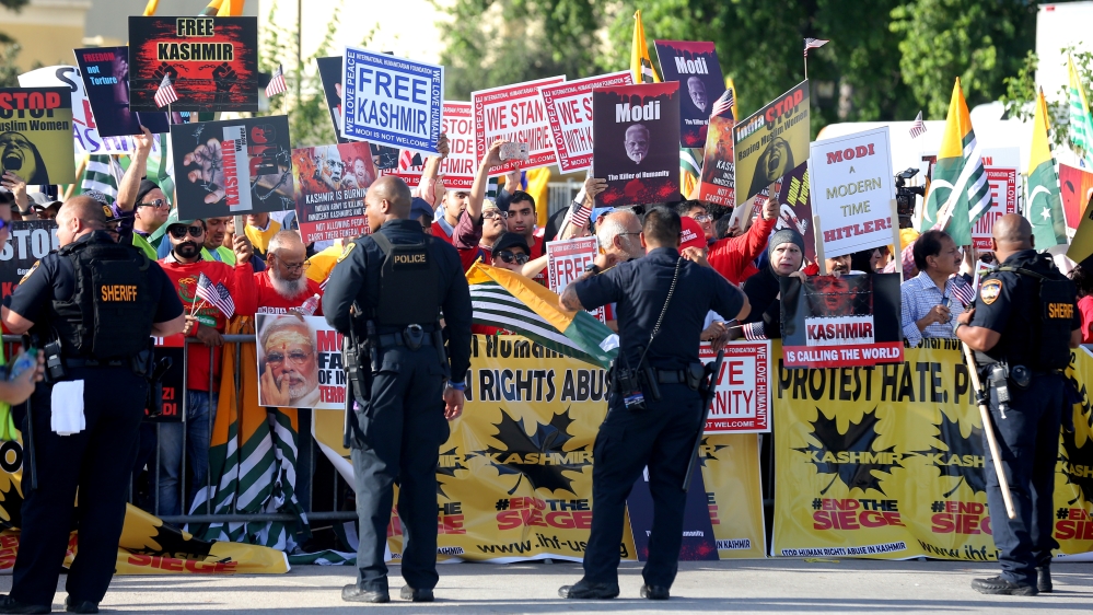 Counter-demonstrators protest during a ‘Howdy, Modi’ rally celebrating India”s Prime Minister Narendra Modi at NRG Stadium in Houston, Texas, Us