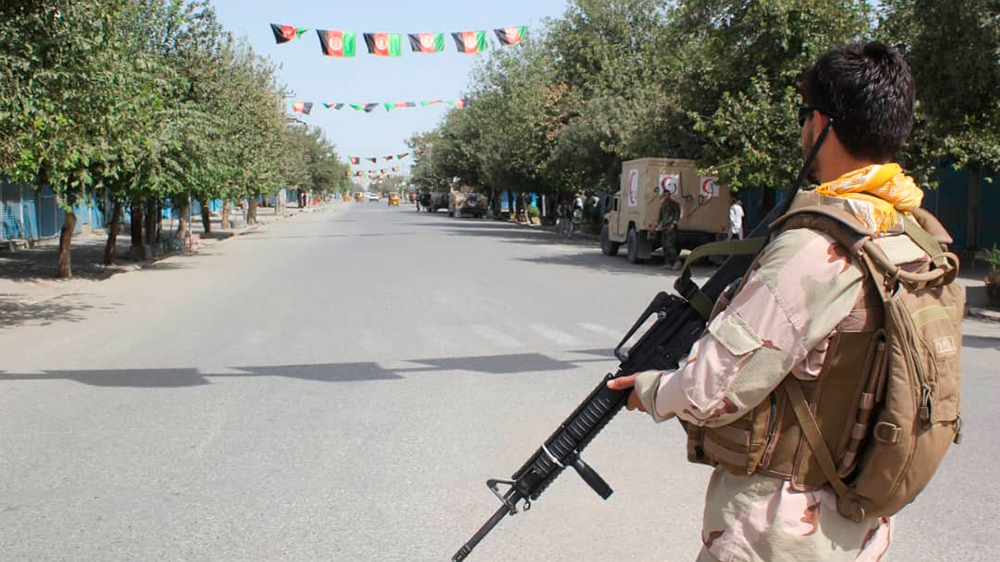 Afghan security forces stand guard during a fight against Taliban fighters in Kunduz province north of Kabul, Afghanistan, Saturday, Aug. 31, 2019. The Taliban have launched a new large-scale attack o