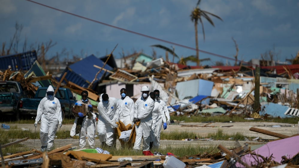 The Royal Bahamas Police Force remove a body recovered from a destroyed neighbourhood following Hurricane Dorian in Marsh Harbour, Great Abaco, Bahamas