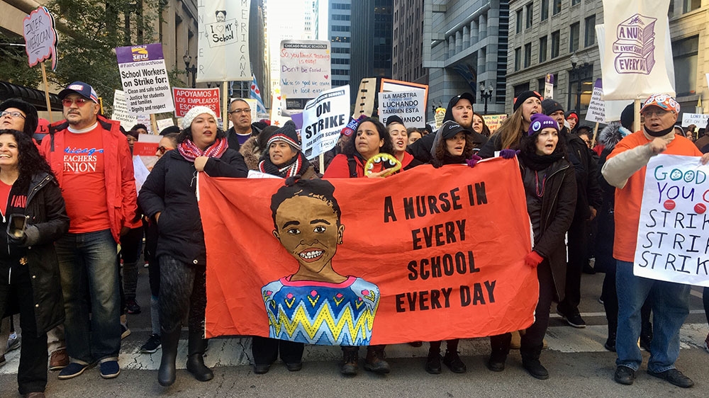 Teachers, counsellors and social workers are picketing for a contract that includes increased trauma care for students