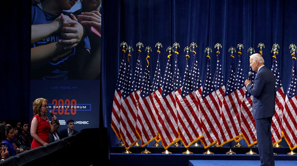 Former Arizona Congresswoman Gabby Giffords asks a question to US Democratic presidential candidate and former US Vice President Joe Biden during a forum held by gun safety organisations