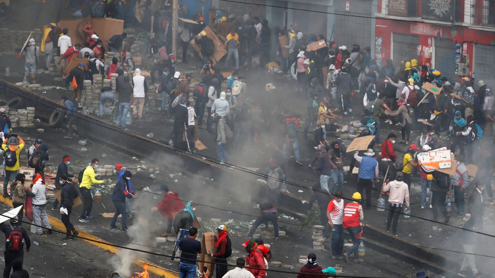 People take part in a protest against Ecuador’s President Lenin Moreno’s austerity measures in Quito