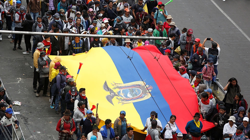Demonstrators march during a protest against Ecuador’s President Lenin Moreno’s austerity measures, in Quito, Ecuador