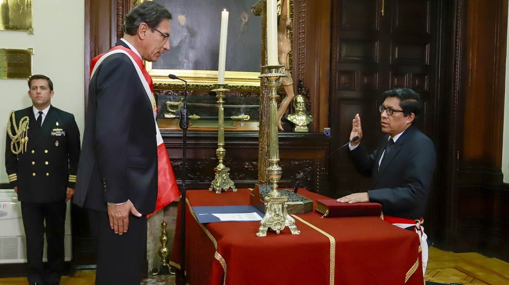 Amid the crisis, President Vizcarra (L) swore in late on Monday his new Chief of Staff Vicente Zeballos