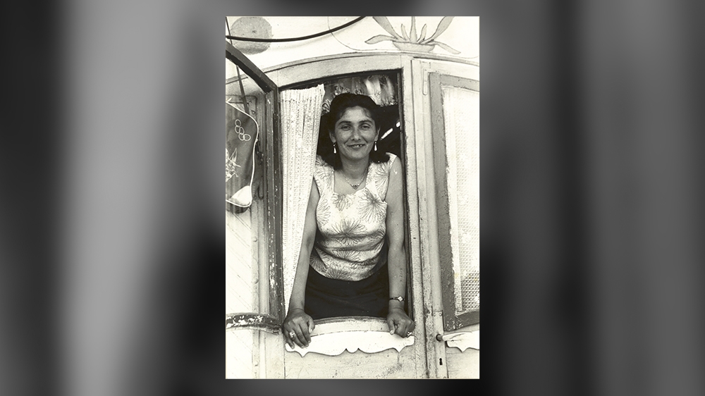Margarete Kraus, a Czech Roma, photographed after the war by Reimar Gilsenbach. Her Auschwitz tattoo is visible on her left arm [Wiener Holocaust Library Collections]