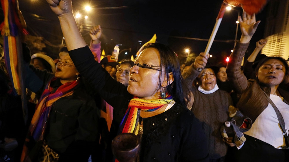 Indigenous protesters march through Quito, Ecuador