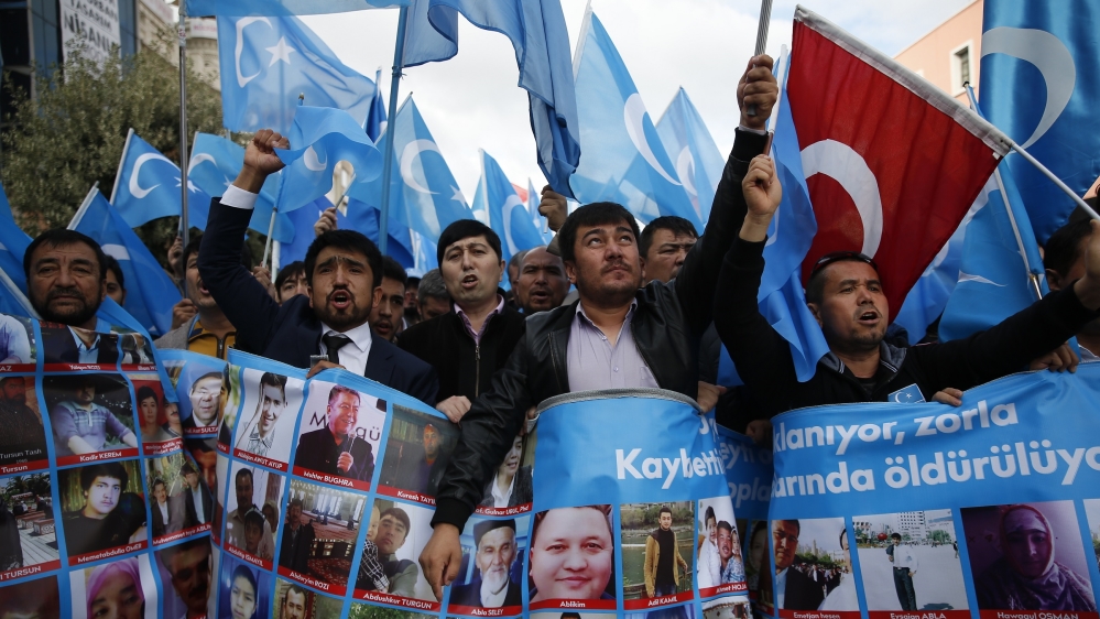 Exiled Uighurs in Turkey demand the release of their relatives during a protest in 2018 in Istanbul