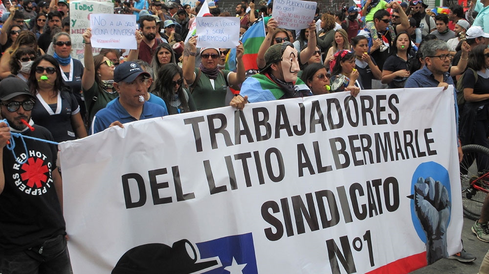 Lithium mine workers participate in a union-led march in Antofagasta, in northern Chile