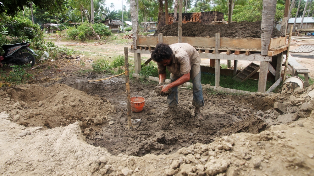 Hadi was a driver before the earthquake. Now he makes bricks for a living