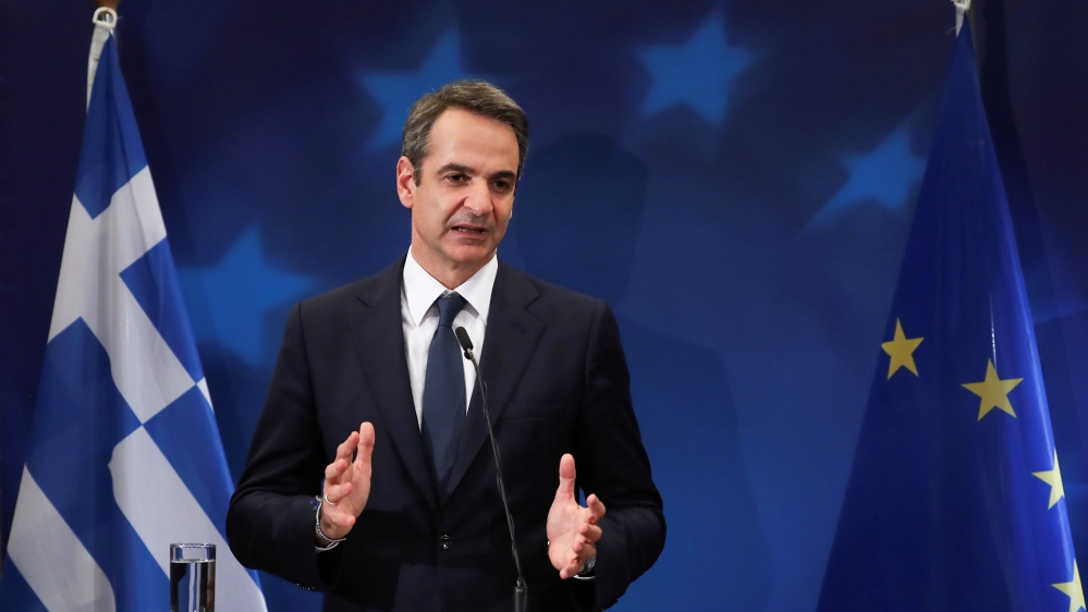 Greek Prime Minister Kyriakos Mitsotakis gestures during a news conference at the end of the European Union leaders summit in Brussels, Belgium December 13, 2019. REUTERS/Yves Herman